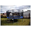 Trampolina Gofit 488 z siatką zabezpieczającą i drabinką.